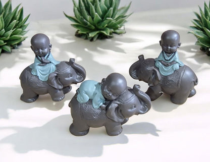 Buddha Riding Elephant Set Of 3, 13x12cm